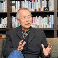Military analyst Kazuhisa Ogawa is interviewed by The Japan Times at his office in Yokohama recently. | SATOKO KAWASAKI