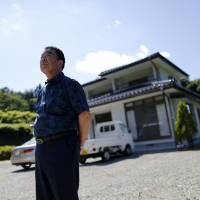 Mikio Watanabe\'s house in Kawamata, Fukushima Prefecture, remains in an exclusion zone and all he can do is maintain it during short visits. Being unemployed and forced to live elsewhere was too much for his wife, who burned herself to death during what she thought would be their final stay at the house. | REUTERS