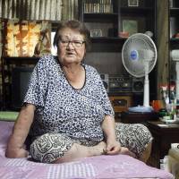 Cho Myung-ja, 76, describes her life as a prostitute serving U.S. military personnel stationed in South Korea, in her room in a shack outside Camp Humphreys, a U.S. military garrison, in Pyeongtaek, South Korea, on Friday. | REUTERS