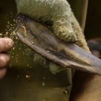 Culinary craftsmen: Seventy-something Isamu Matsuue shaves a piece of katsuobushi (smoked skipjack tuna) before it is inoculated with mold spores. Meet the artisan family striving for a better fish flake