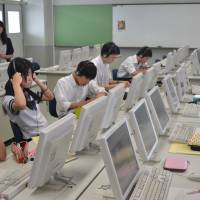 Teach to the test: Students at an Osaka high school take a TOEFL iBT practice exam. The Osaka Board of Education is introducing teaching toward the Internet-based TOEFL iBT exam to nine high schools next year, and eight more in 2016.   | J.J. O\'DONOGHUE