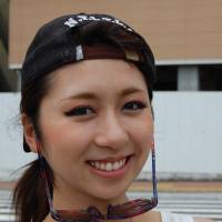 Haruna Fukunaga, Cosmetics consultant, 21 (Japanese): Somebody posted a picture of this on SNS and that’s why I wanted to take a photo here. This statue makes me think that women suffered discrimination in the Meiji Era, but today it might be different — the woman might kick the man. | COURTESY OF JOHN SPIRI