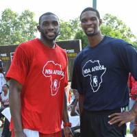 Clinic instructors: Dzaflo Larkai (left) and Miami Heat star Chris Bosh said they enjoyed working with teenage basketball players last weekend in Ghana. | NBA AFRICA