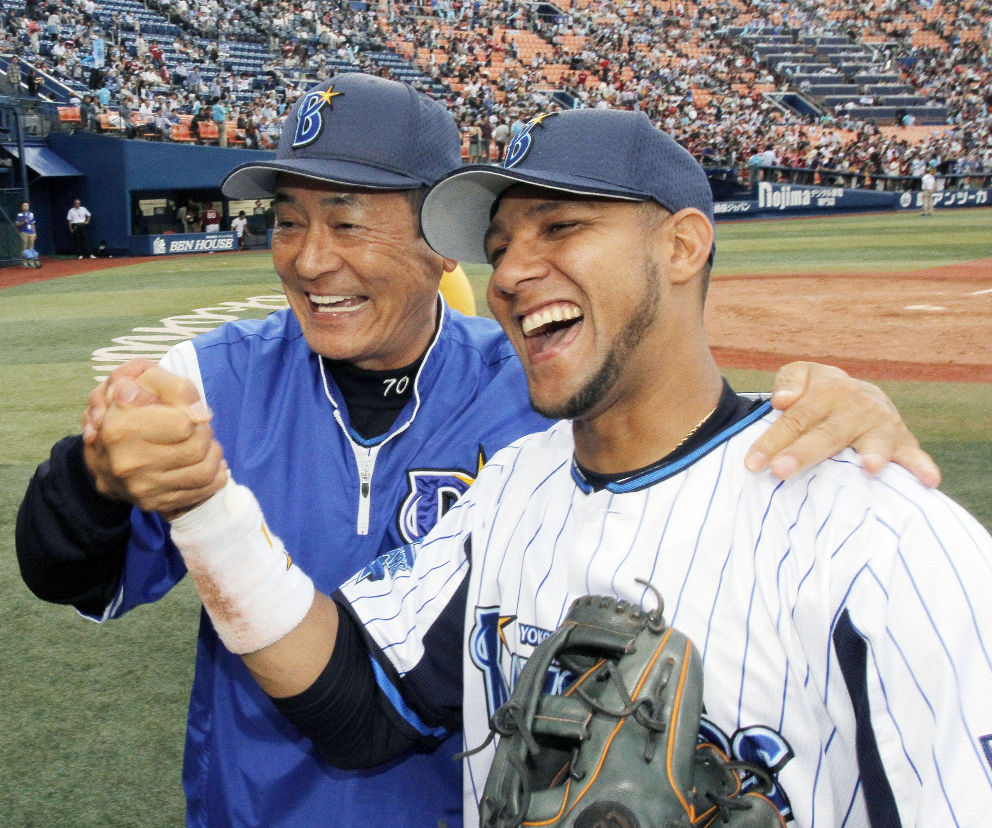 Rising through the ranks: Yulieski Gourriel (right) has been an almost instant hit for manager Kiyoshi Nakahata and the BayStars. | KYODO