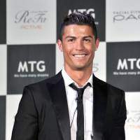 Famous face: Soccer superstar Cristiano Ronaldo, a new spokesman for MTG, a Nagoya-based company specializing in beauty and wellness products, meets the press on Tuesday in Tokyo.  | YOSHIAKI MIURA