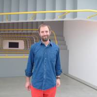 Unusual steps: Leandro Erlich stands in front of \"Staircase,\" one of the works of his solo show at 21st Century Museum of Contemporary Art, Kanazawa. | SACHIKO TAMASHIGE