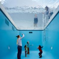 Under water: \"The Swimming Pool\" (2004)  | &#169; LEANDRO ERLICH STUDIO; PHOTO BY NAKAMICHI ATSUSHI /NACÁSA &amp; PARTNERS