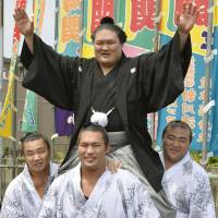 Goeido celebrates his promotion to sumo\'s second-highest rank of ozeki after his induction ceremony in Aichi Prefecture on Wednesday.  | KYODO