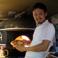 Bakka owner-pizzaiolo Yutaka Hazama has gone to the trouble of installing a classic wood-fired pizza oven in his truck.  | ROBBIE SWINNERton