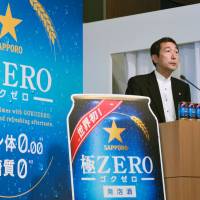 Sapporo Breweries Ltd. President Masaki Oga announces a new version of Sapporo Goku Zero with a higher liquor tax rate at a news conference in Tokyo on July 15. The National Tax Agency determined that its original product was ineligible for \"third category beer\" status, which is taxed at a lower rate. | KYODO