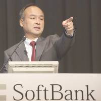 Masayoshi Son, chairman and chief executive officer of SoftBank Corp., speaks during a news conference in Tokyo Aug. 8. | BLOOMBERG