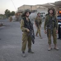 Israeli soldiers secure the area were a mortar fired from the Quneitra province after Syrian rebels clashed with President Bashar Assad’s forces hit in a community in the Israeli controlled Golan Heights on Wednesday. Syrian rebels, including fighters from an al-Qaida-linked group, seized control of a frontier crossing with Israel in the Golan Heights the same day after heavy clashes with Assad’s forces, activists and rebels said. Islamist fighters seize Syria crossing near Israel, monitors report