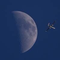 An Israeli drone circles over Gaza City on Sunday. Israeli authorities said Tuesday they had arrested a Palestinian suspected of being involved in the kidnapping and murder of three Israeli teenagers in June. The kidnapping and murders sparked a cycle of violence that led to the monthlong conflict between Israel and Palestinian militants in the Gaza Strip. | AP