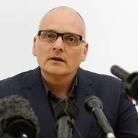 Dr. Michael Jacobs, clinical lead in infections diseases at the Royal Free Hospital in north London, gives a news conference on the condition of Ebola sufferer William Pooley, who is a patient at the hospital, Tuesday. The first British Ebola patient, the 29-year-old male nurse has been treated with the experimental drug ZMapp at the hospital, after he was flown in from West Africa. | AP