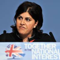 Then-Chairman of the Conservative Party Sayeeda Warsi delivers a speech in Birmingham, central England, on Oct. 3, 2010. The first Muslim woman to sit in the Cabinet, Warsi resigned Tuesday over the British government\'s policy on Gaza. | AFP-JIJI