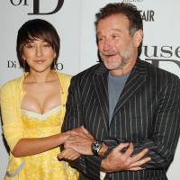 Actors Robin Williams and his daughter, Zelda Williams, pose for photographers during the premiere of their film “House of D” in New York on April 10, 2005. Zelda Williams has said she was the target of abuse on social-networking sites after her Oscar-winning father was found dead Monday in an apparent suicide at his Northern California home. Daughter of Robin Williams faced online abuse after father's suicide