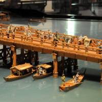 A miniature model of the Ryogoku Bridge as it stood during the Edo Period is displayed at the Edo-Tokyo Museum, depicting the area\'s hustle and bustle at the time. | SATOKO KAWASAKI