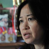 Veteran foster mother Mika Hobbs talks about taking in and raising abused and neglected children, during a recent interview at her home in Machida, western Tokyo. Foster parent shortage takes growing toll on children