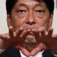 Defense Minister Itsunori Onodera gives a speech at the Asian Affairs Research Council in Tokyo on Monday. | REUTERS