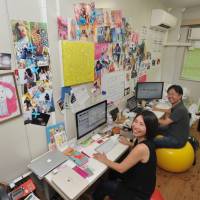 Megumi Sumi and Yusaku Hamajima of Hanalabs, which offers female college students in Japan a chance to explore alternatives that could advance their careers, pose in their office in Tokyo during a July 29 interview with The Japan Times. | YOSHIAKI MIURA