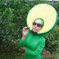 Lady Hebe, a character promoting the \"hebesu\" citrus fruit for the city of Hyuga, Miyazaki Prefecture, poses for a photo in a local orchard July 19. | KYODO