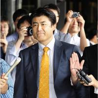 Tatsuya Kato, the Seoul bureau chief of the Sankei Shimbun, arrives at the Seoul Central District Prosecutors\' Office in the South Korean capital on Monday. | KYODO