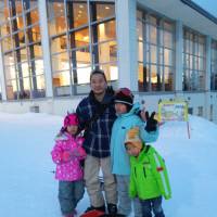 Hiroki Yoshida, a single father based in Konosu, Saitama Prefecture, poses with his three children, Chitose, Soju and Shiryo (left to right), during a ski trip to Gunma Prefecture in January. COURTESY OF HIROKI YOSHIDA | AFP-JIJI