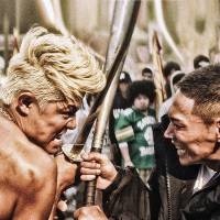 Against the world: Mera (Ryohei Suzuki), leader of Bukero\'s Wu-Ronz mob, deep in battle with Musashino Saru leader Kai (Young Dais) in Sion Sono\'s over-the-top hip-hop-themed film \"Tokyo Tribe.\" | © 2014 INOUE SANTA/\'TOKYO TRIBE\' FILM PARTNERS