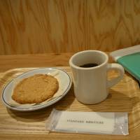 Take a break: Reading over coffee at Standard Bookstore. | J.J. O\'DONOGHUE