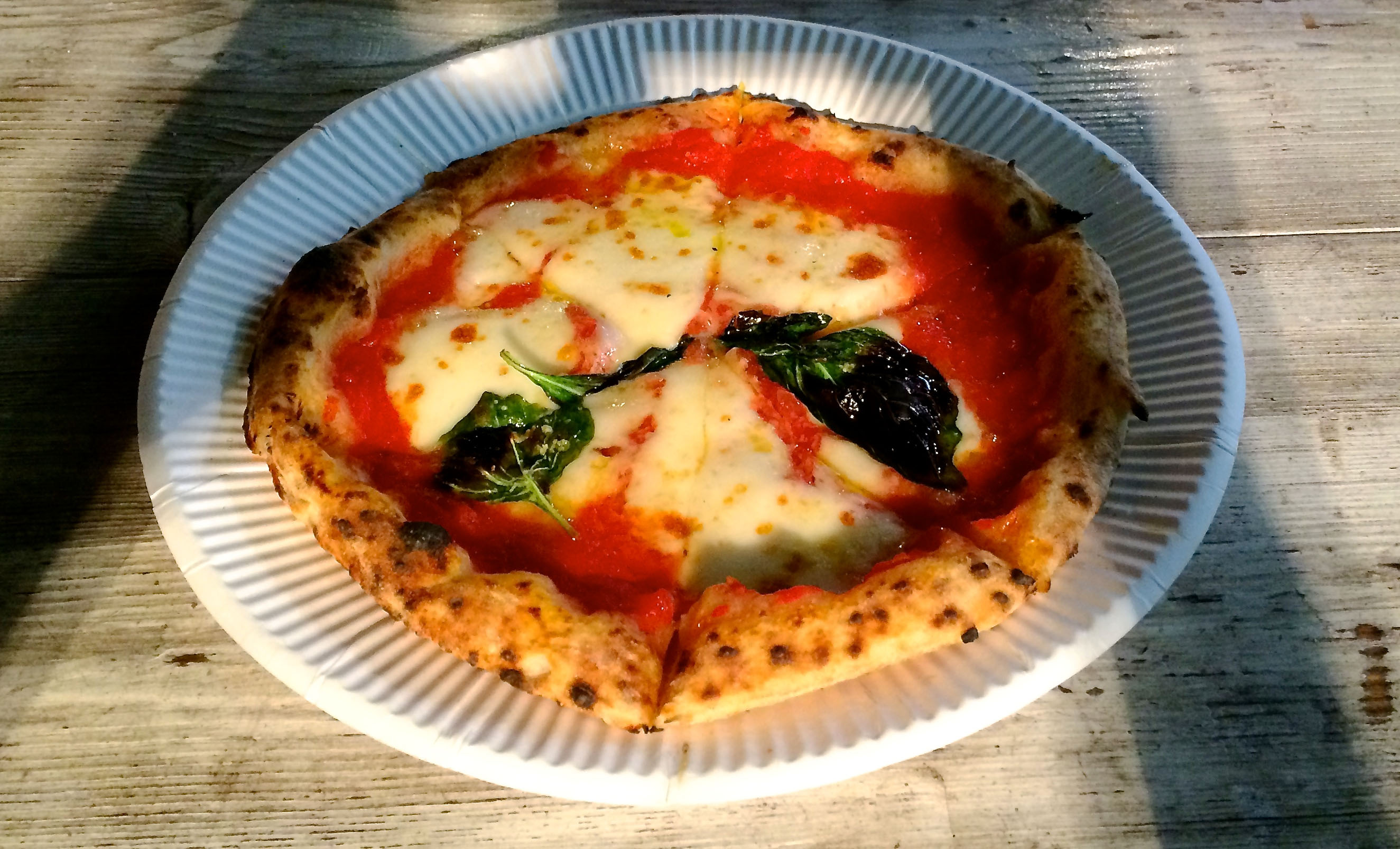 Oven-fresh: The classic Marinara pizza at Bakka in Shibuya. | ROBBIE SWINNERTON