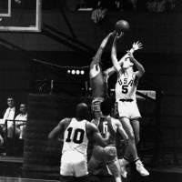 Major contributor: U.S. captain Bill Bradley (5) averaged 10.1 points in nine games at the 1964 Tokyo Olympics as coach Hank Iba\'s team captured the gold medal. | AP