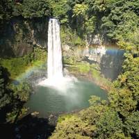 A rainbow appears in the mist at the Gorogataki Waterfall. Slow food and fast water in a rural corner of Kumamoto