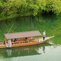 Slow route: Small wooden boats are still used to cross the Nishiki River. | ANGELES MARIN CABELLO