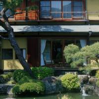 Rooms with a view: Kiun-Kaku is landscaped to accommodate full views of the garden from the rooms of the main house. Pictured here is the exterior of a room from when the main buildings served as part of a Japanese inn. | STEPHEN MANSFIELD