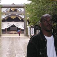 Confronting reality: Baye McNeil visits Yasukuni Shrine in Tokyo shortly after his arrival in 2004. A high price to pay for a little peace of mind