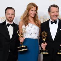 “Breaking Bad” stars Aaron Paul (left), Anna Gunn (center) and Bryan Cranston pose with their acting awards in Los Angeles on Monday. 'Breaking Bad' goes out on top at Emmy Awards