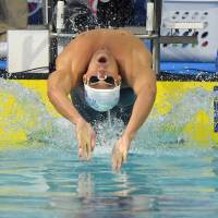 Competition begins: Michael Phelps starts the men\'s 100-meter backstroke final at U.S. nationals on Saturday in Irvine, California. Phelps finished sixth.  | AP