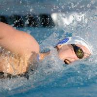 Record-setting speed: Katie Ledecky sets a world record time of 3 minutes, 58.86 seconds in the women\'s 400-meter freestyle at the 2014 USA National Championships in Irvine, California, on Saturday.  | REUTERS/USA TODAY