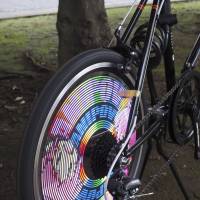 Spinning out: The \"ANIPOVmini\" wheel by Suns &amp; Moon Laboratory displays animation as you ride. | AP