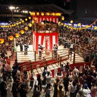 Street dance: Locals and visitors join in the Roppongi Hills Bon Odori celebrations. | AP