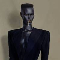Left: Photographer Hal\'s \"Flesh Love #27, Lim & Kyohei\" (2010).  Right: Jean-Paul Goude\'s \"Blue-black on brown,\" New York (1981), featuring Grace Jones. | AFP-JIJI