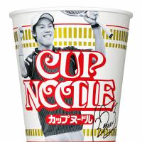 Nissin Food Products Co. will release Cup Noodle packaging featuring star tennis player Kei Nishikori to celebrate his historic run to the U.S. Open final. The limited edition product shows him in a victorious pose, along with his signature and the motto \"Hungry to win.\" | KYODO