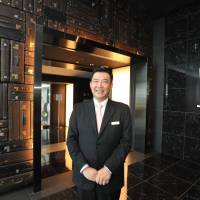 Hiroyuki Tobari, general manager of Royal Park Hotel the Haneda, poses for a photo at the airport in Tokyo on Friday. | YOSHIAKI MIURA