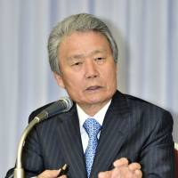 Keidanren Chairman Sadayuki Sakakibara speaks at a press conference in Tokyo in June. | KYODO