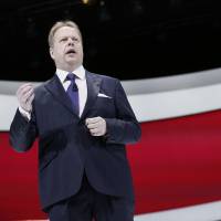Nissan Motor Co. executive Andy Palmer speaks during the 2014 New York Auto Show in April. Aston Martin Lagonda Ltd. has tapped him to run the 101-year-old U.K. sports car company. | BLOOMBERG