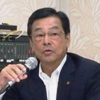 Pioneer Corp. President Susumu Kotani holds a news conference Tuesday afternoon in Tokyo. | KYODO