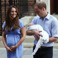 Britain\'s Prince William and his wife Kate appear with their baby son George outside the Lindo Wing of St Mary\'s Hospital in central London on July 23, 2013. | REUTERS