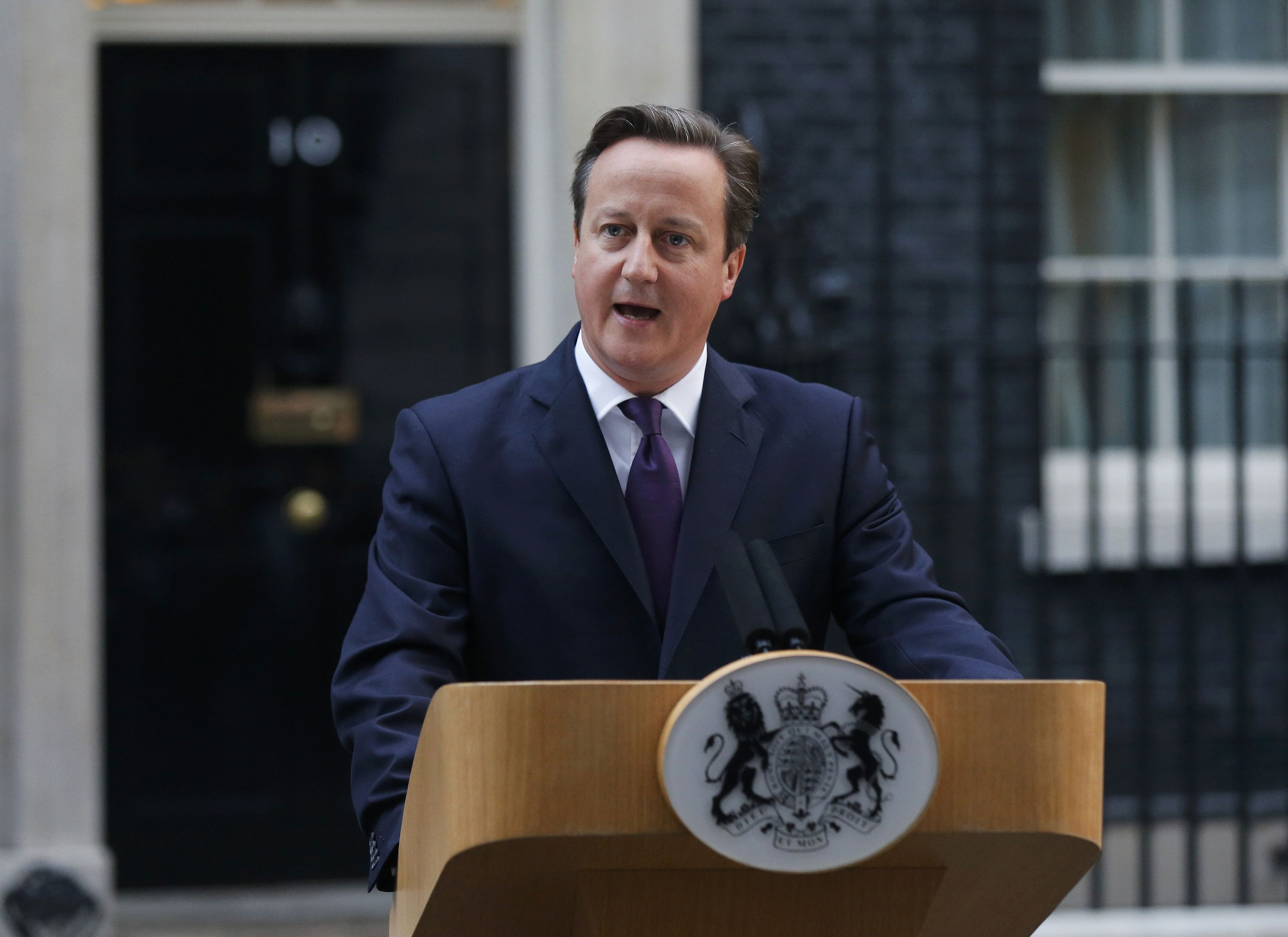 Britain's Prime Minister David Cameron speaks to the media Friday in front of Number 10 Downing Street in London regarding the results of the Scottish independence referendum. | REUTERS
