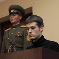 U.S. citizen Matthew Miller sits in the dock at the Supreme Court during his trial in Pyongyang on Sept. 14. | AP
