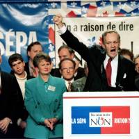 Canadian Prime Minister Jean Chretien addresses a pro-Canada \"no\" rally in his hometown riding of Shawinigan, Quebec, on Oct. 6, 1995. | REUTERS